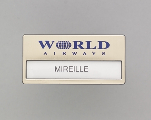 Image: flight attendant name pin: World Airways, Mireille