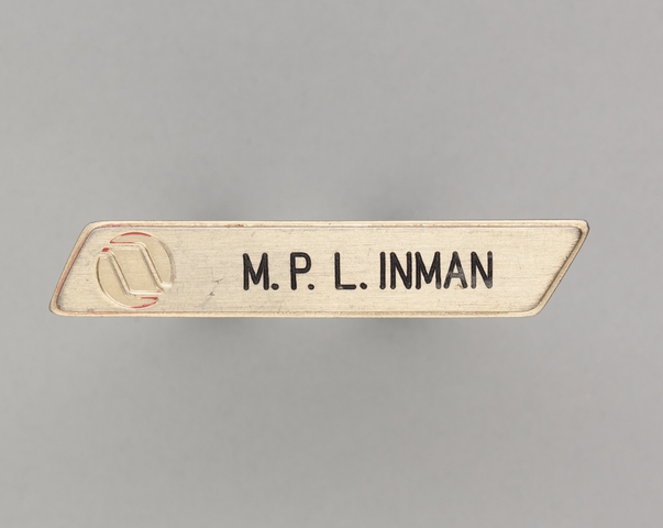 Name pin: Northwest Orient, M. P. L. Inman