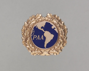 Image: flight officer cap badge: Pan American Airways System