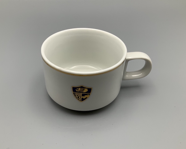 Coffee cup: Western Airlines, “60th Anniversary Shield” pattern