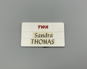 Image: name badge: TWA (Trans World Airlines), Sandra Thomas