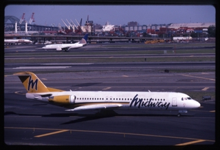 Image: slide: Midway Airlines, Fokker F.100, Newark International Airport (EWR)