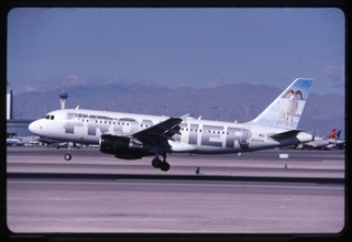 Image: slide: Frontier Airlines, Airbus A318, McCarran International Airport (LAS)