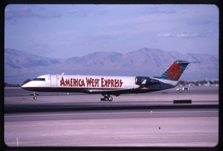 Image: slide: Mesa Airlines, Bombardier CRJ-200, McCarran International Airport (LAS)