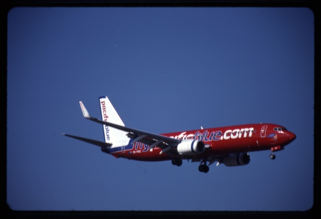 Slide: Pacific Blue Airlines, Boeing 737-800, Melbourne Airport (MEL)