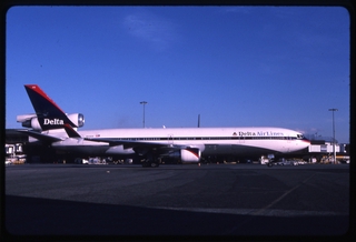 Image: slide: Delta Air Lines, McDonnell Douglas MD-11, John F. Kennedy International Airport (JFK)