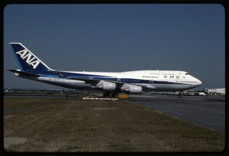 Image: slide: ANA (All Nippon Airways), Boeing 747-400, John F. Kennedy International Airport (JFK)