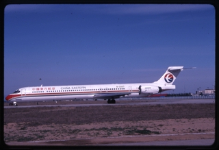 Image: slide: China Eastern Airlines, McDonnell Douglas MD-90, Beijing Capital International Airport (PEK)