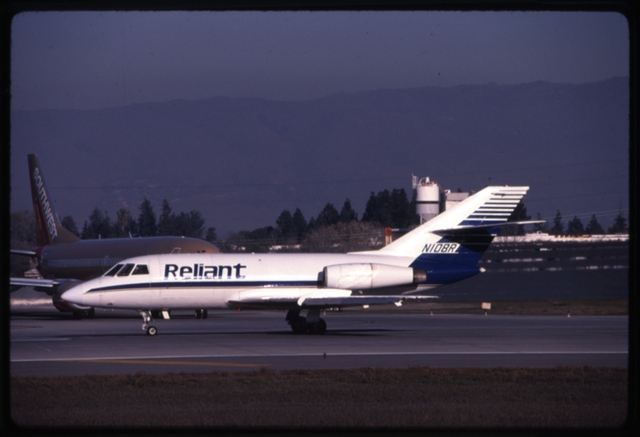 Slide: Reliant Airlines, Dassault Falcon 20, San Jose International Airport (SJC)