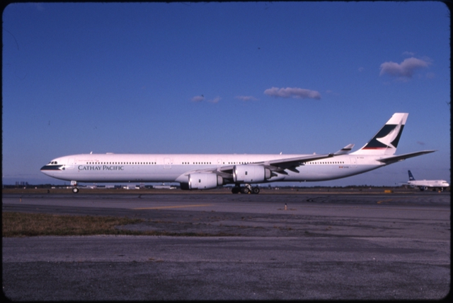 Slide: Cathay Pacific Airways, Airbus A340-300, John F. Kennedy International Airport (JFK)