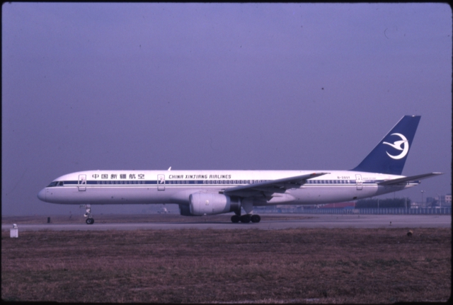 Slide: China Xinjiang Airlines, Boeing 757-200, Beijing Capital International Airport (PEK)