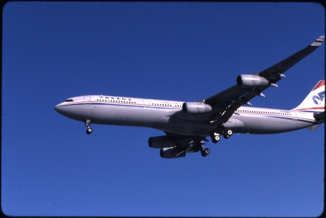 Slide: China Southwest Airlines, Airbus A340, Beijing Capital International Airport (PEK)