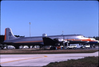 Image: slide: American Airlines Cargo, Douglas DC-7B, Miami - Opa Locka Executive Airport (OPF)