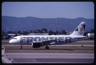 Image: slide: Frontier Airlines, Airbus A319-100, San Jose Airport (SJC)