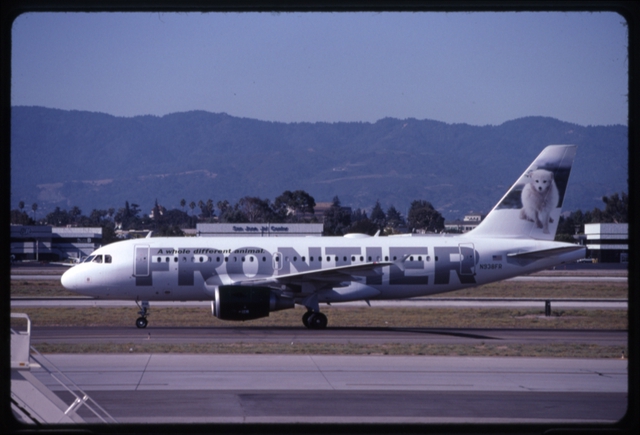 Slide: Frontier Airlines, Airbus A319-100, San Jose Airport (SJC)