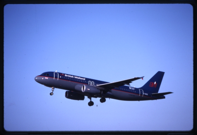 Slide: British Midland Airways, Airbus A320-200, Amsterdam Airport Schiphol (AMS)