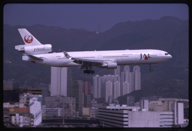 Slide: Japan Airlines, McDonnell Douglas MD-11, Kai Tak Airport (HKG)