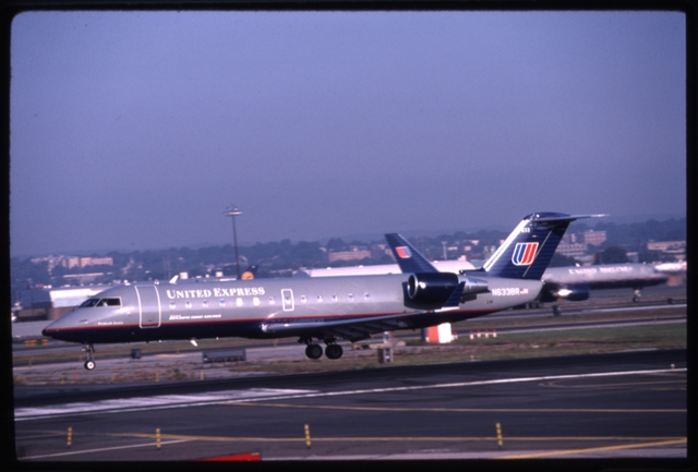 Slide: United Express, Bombardier CRJ200, Newark International Airport (EWR)