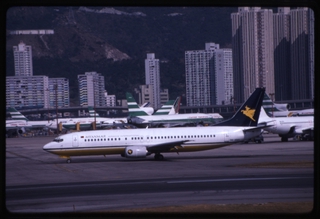 Image: slide: Myanmar Airways, Boeing 737-400, Hong Kong International Airport