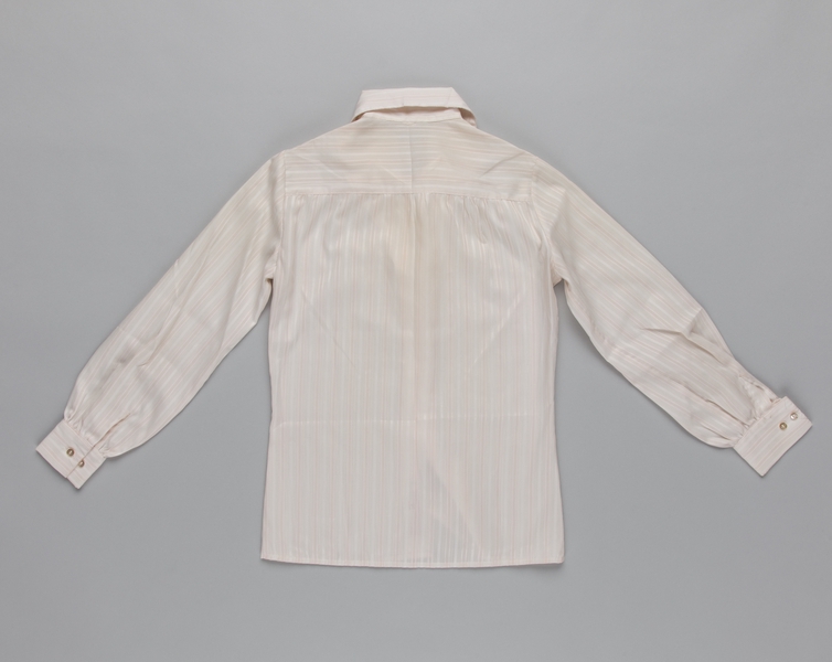 Image: flight attendant blouse: United Airlines