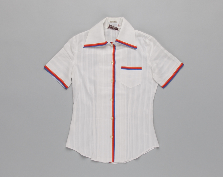 Image: ticket agent blouse: United Airlines