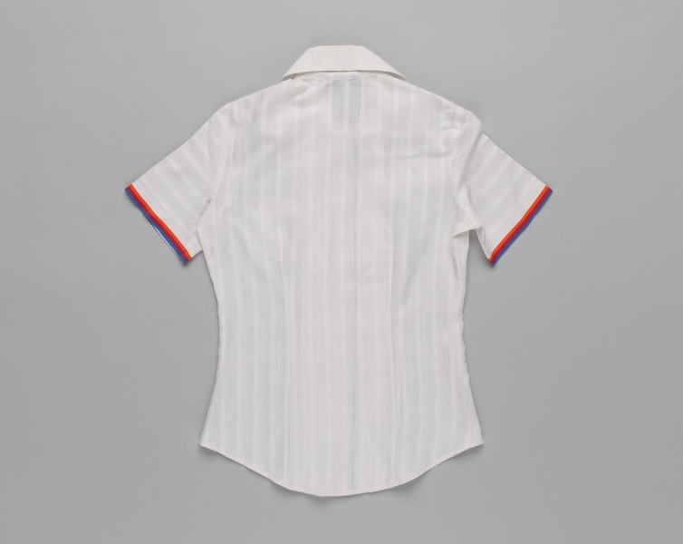 Image: ticket agent blouse: United Airlines