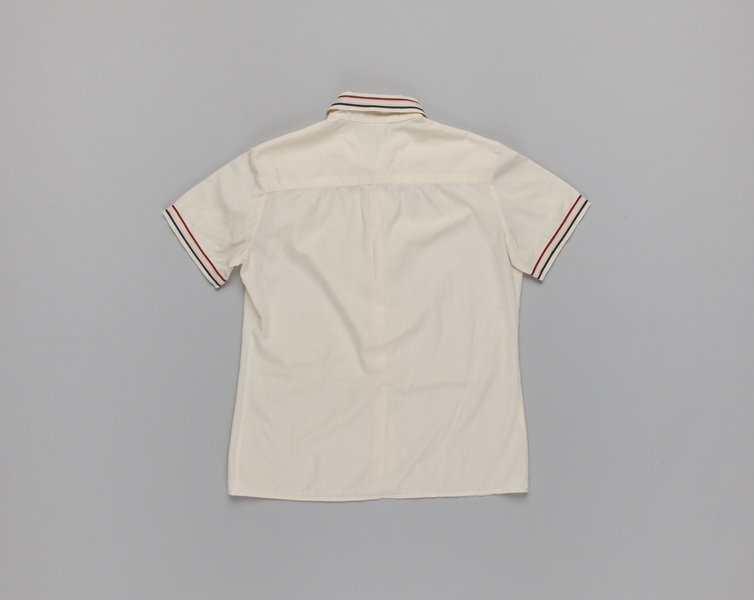 Image: customer service agent blouse: American Airlines