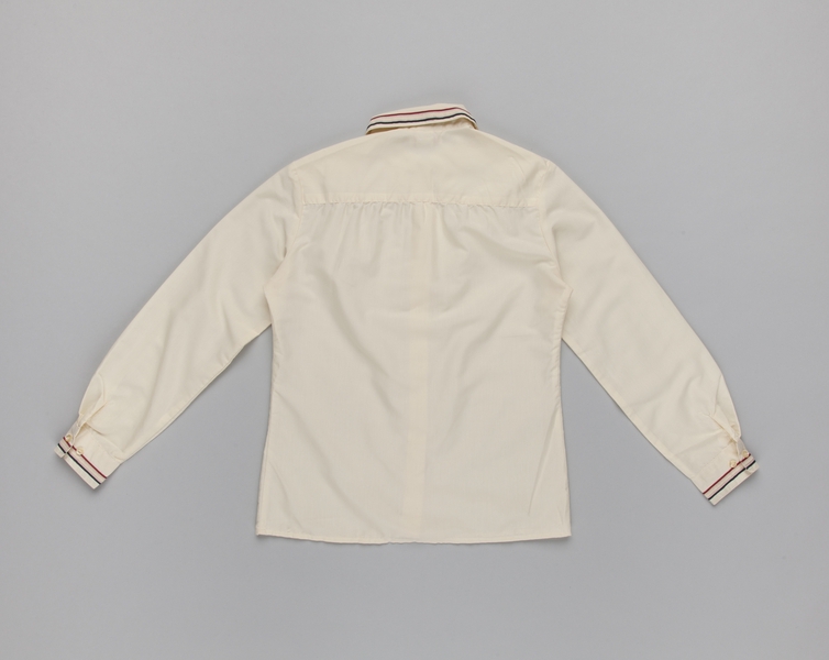 Image: customer service agent blouse: American Airlines