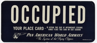 Image: seat occupied sign: Pan American World Airways