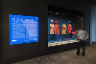 Image: Installation view of "Flight Patterns: Airline Uniforms from the 1960s–70s"