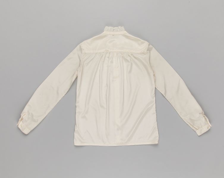 Image: flight attendant blouse: Delta Air Lines