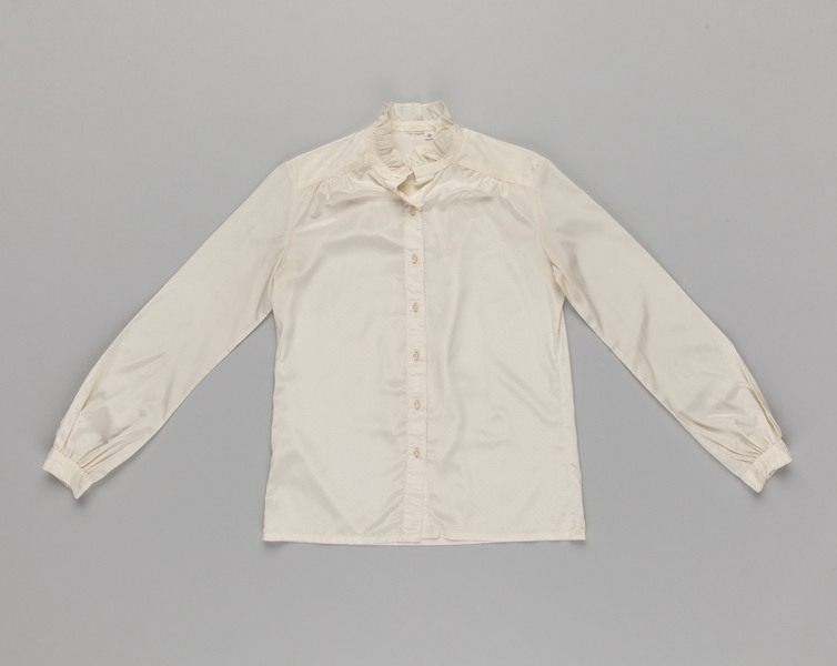 Image: flight attendant blouse: Delta Air Lines