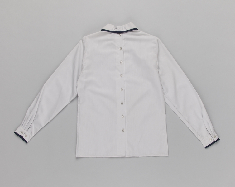 Image: flight attendant blouse: Delta Air Lines