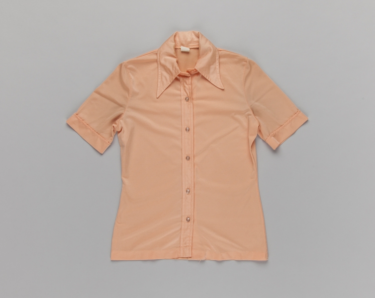 Image: flight attendant blouse: Delta Air Lines