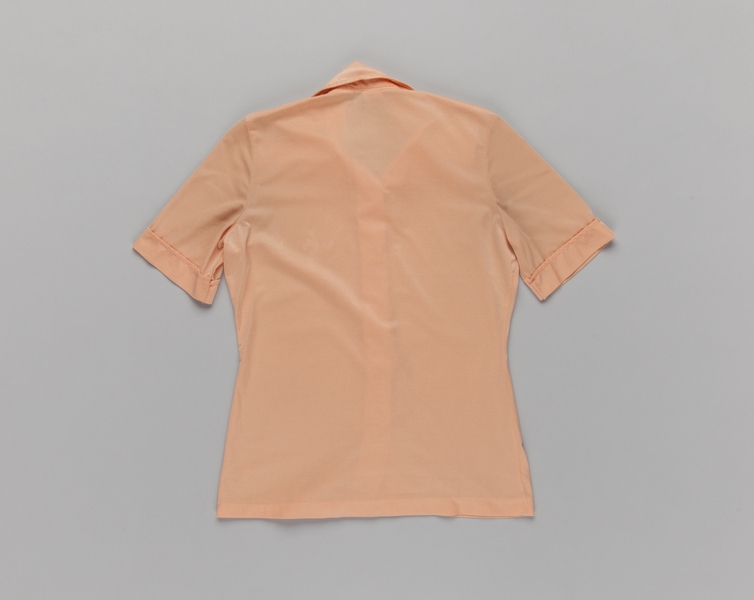 Image: flight attendant blouse: Delta Air Lines