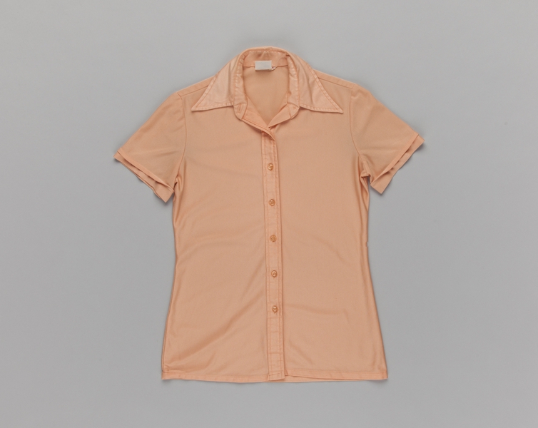 Image: flight attendant blouse: Delta Air Lines