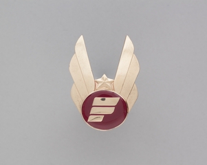 Image: flight officer cap badge: Frontier Airlines