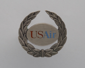 Image: gate agent hat badge: USAir