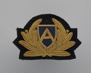 Image: flight officer cap badge: Autair International Airways