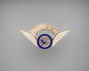 Image: flight officer cap badge: Aloha Airlines