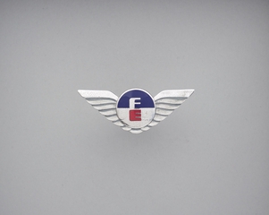 Image: flight officer cap badge: Federal Express