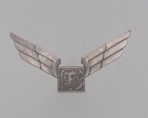 Image: flight officer cap badge: Flying Tiger Line
