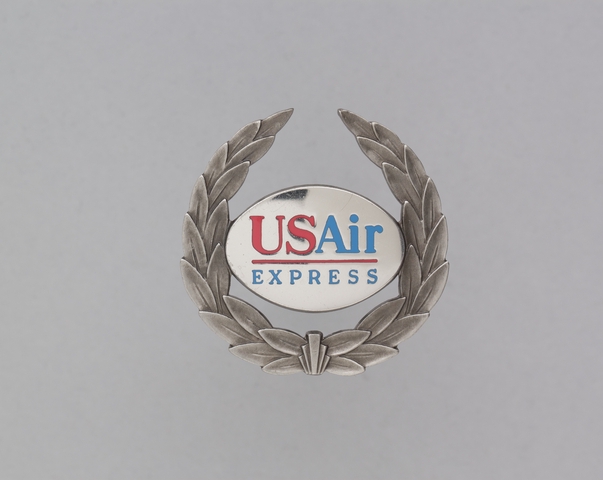 Flight officer cap badge: USAir Express