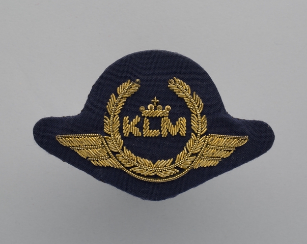 Flight officer cap badge: KLM (Royal Dutch Airlines)