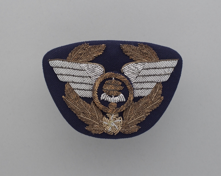 Image: flight officer cap badge: ANA (All Nippon Airways)