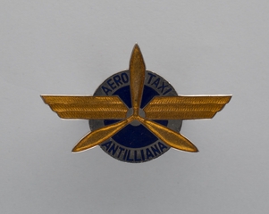 Image: flight officer cap badge: Aero Taxi Antilles