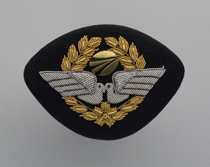 Image: flight officer cap badge: Japan Asia Airways