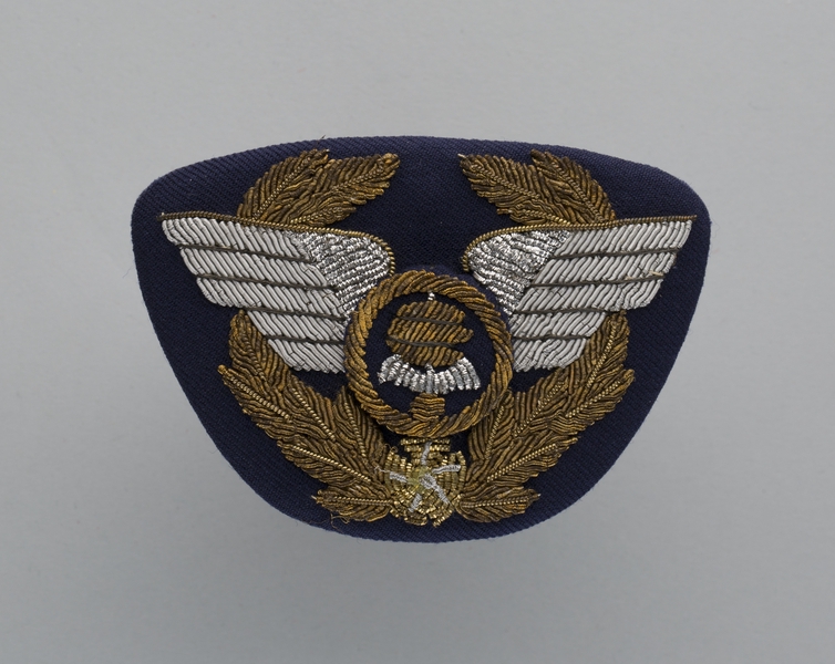 Image: flight officer cap badge: ANA (All Nippon Airways)