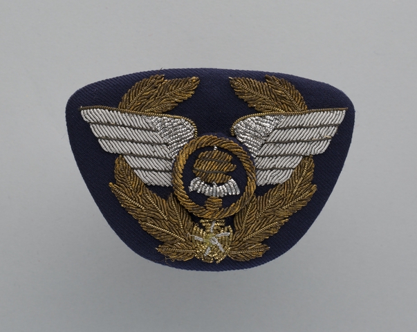 Flight officer cap badge: ANA (All Nippon Airways)