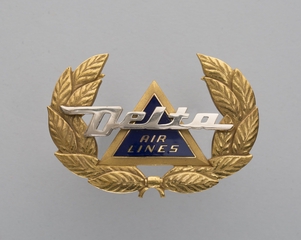 Image: flight officer cap badge: Delta Air Lines